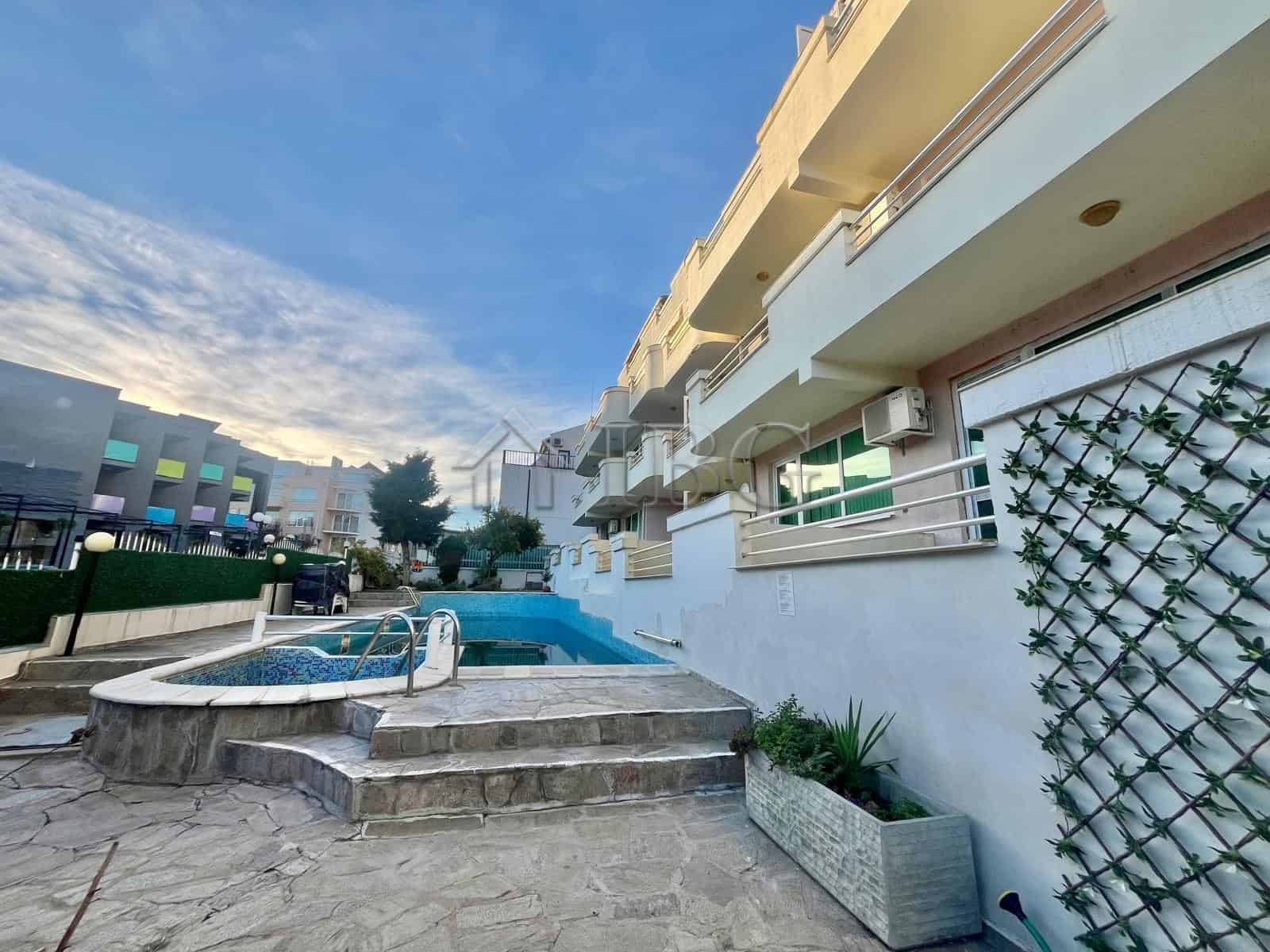 Spacious 2-bedroom apartment featuring a partial sea view, modern amenities, and a private pool in S.