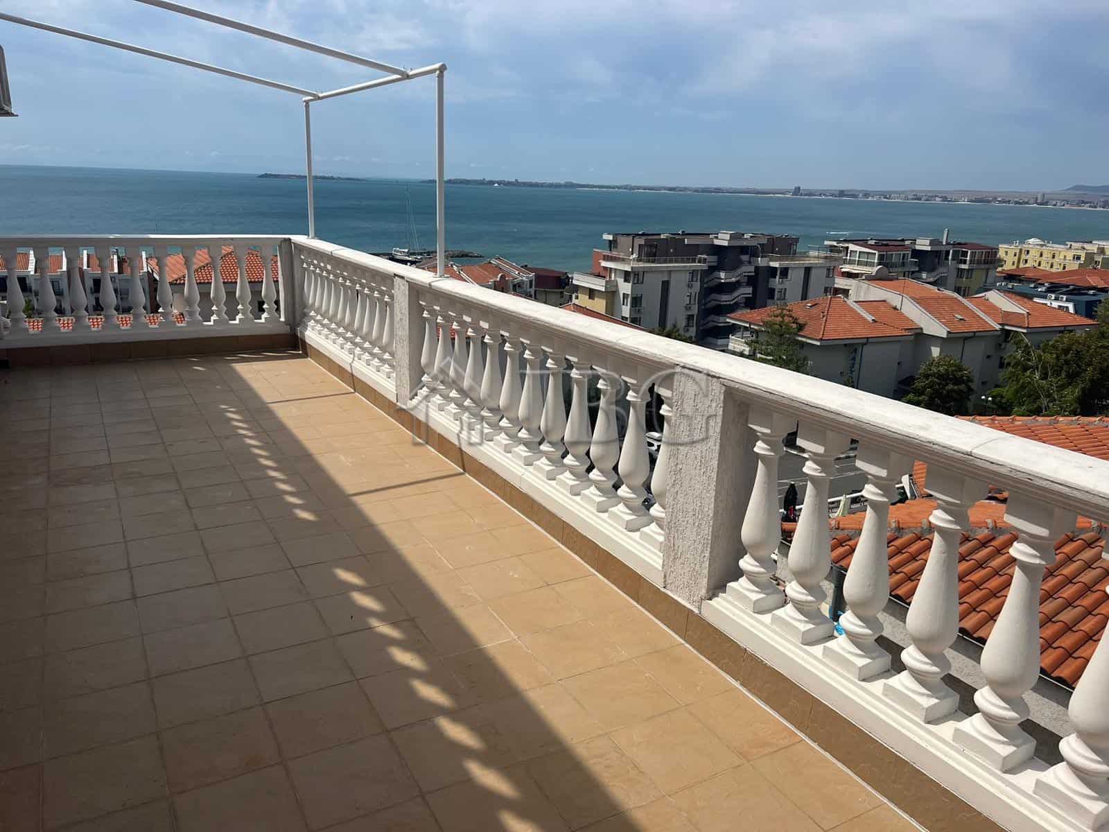 Balcony overlooking the yacht harbor and sea in Sveti Vlas, Bulgaria, offering stunning views from a.