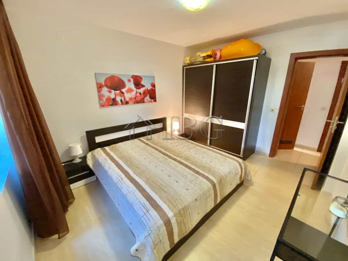 Bright bedroom with large bed and modern decor in Sveti Vlas.