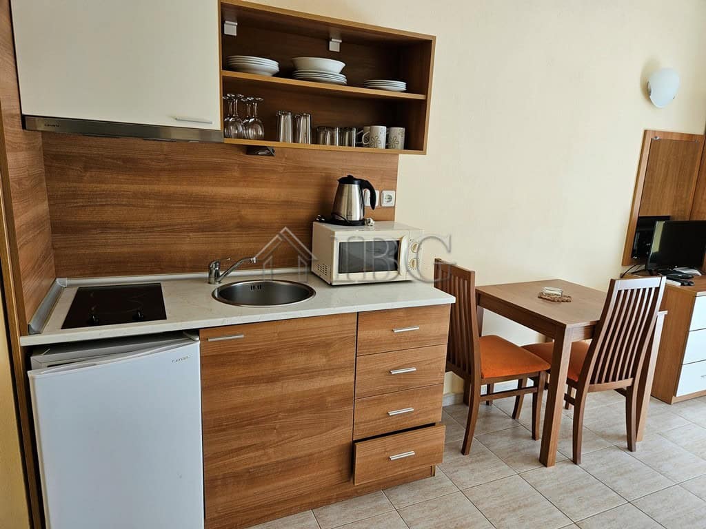 Furnished 42 sq. m. studio with balcony in Pollo Resort, Sunny Beach, featuring modern kitchen and d.