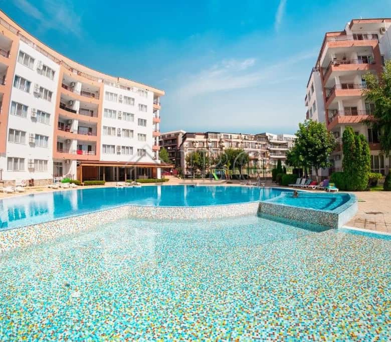 Sea view one-bedroom apartment near the beach in Ravda, Bulgaria. Modern complex with pool and lush.