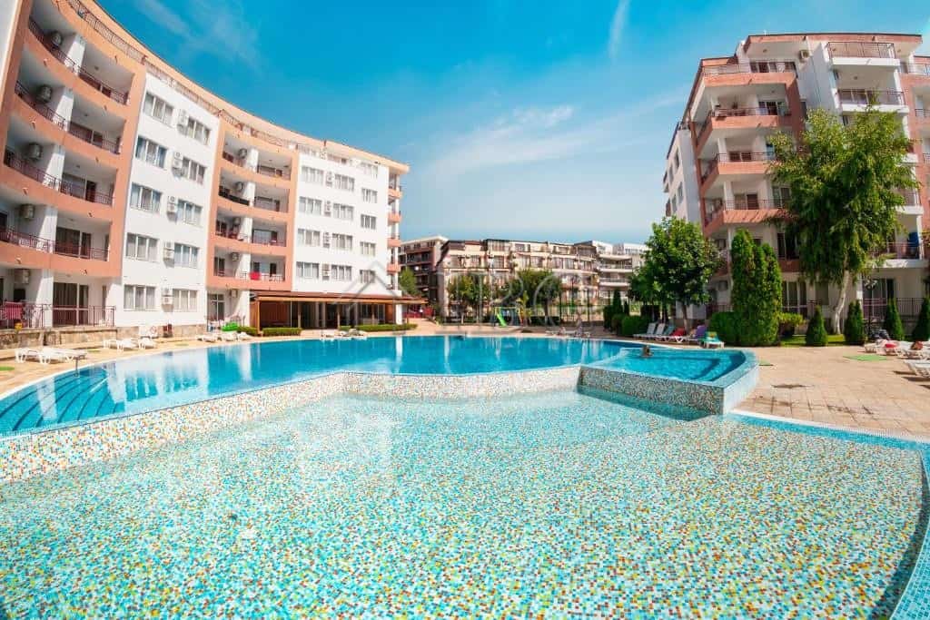 Sea view one-bedroom apartment near the beach in Ravda, Bulgaria. Modern complex with pool and lush.