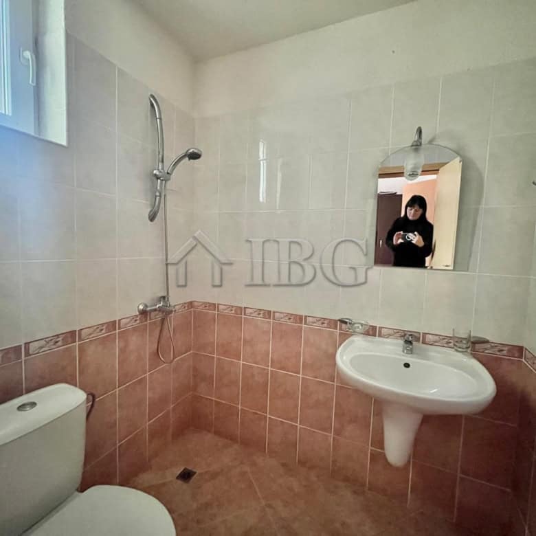 Bright bathroom with modern fixtures and natural light.