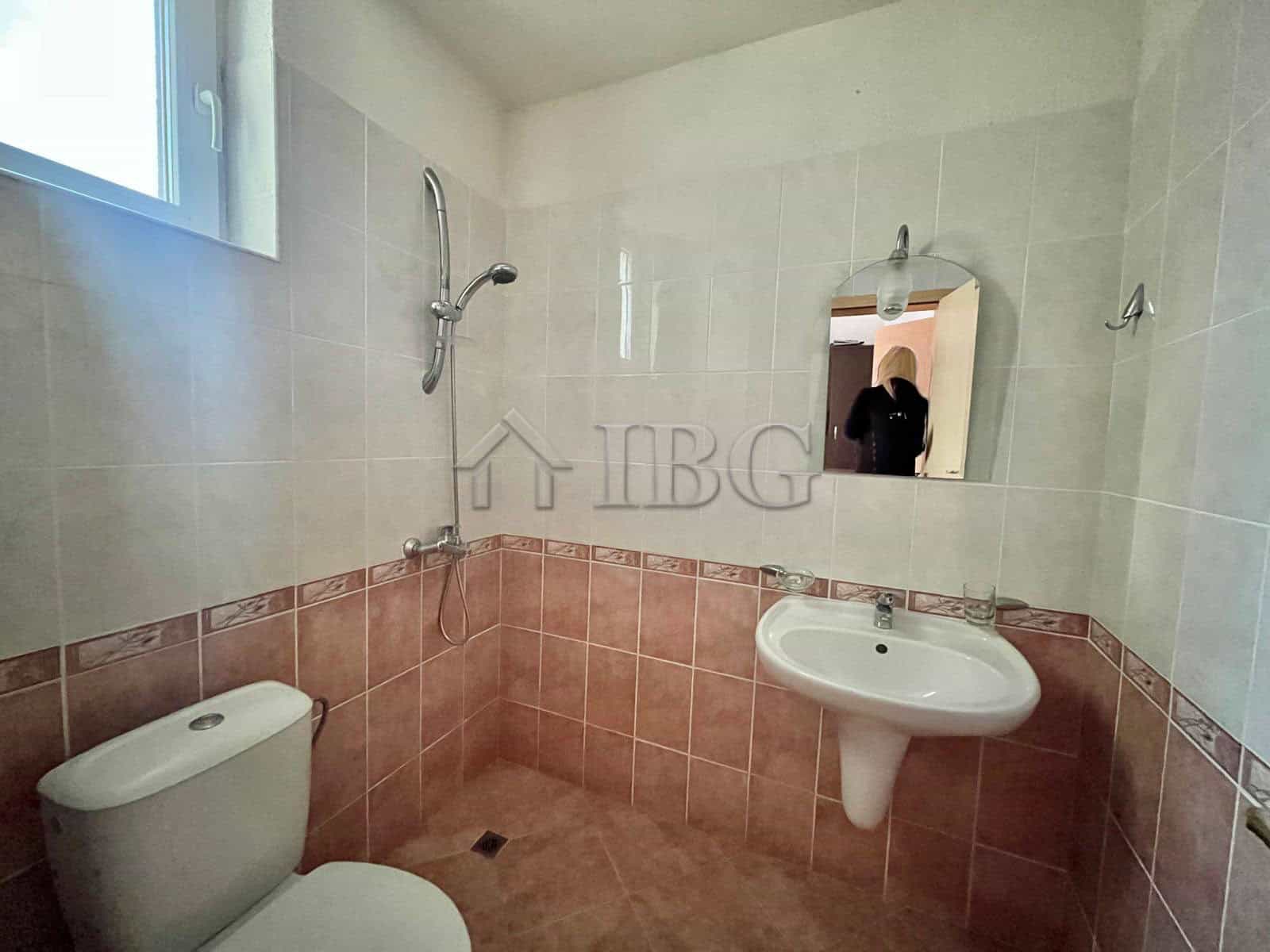 Bright bathroom with modern fixtures in a 2-bedroom apartment in Sunny Beach. Perfect for a relaxing.