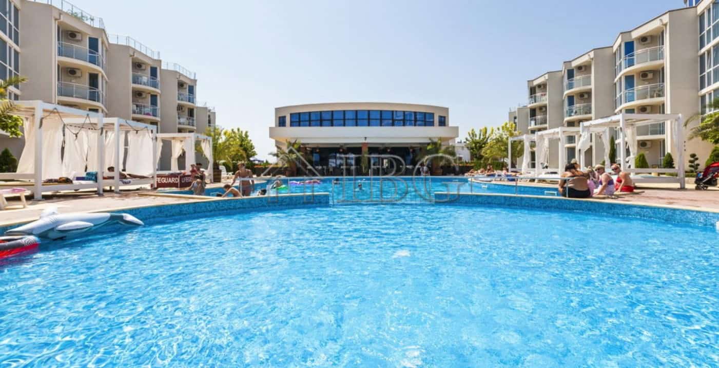 Pool view at Atlantis Resort & Spa in Sarafovo, Burgas, featuring modern apartments with sea and poo.