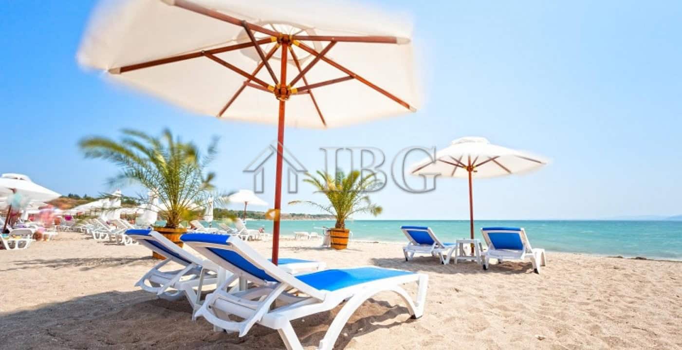 Beach chairs and umbrellas overlooking the sea at Atlantis Resort, Sarafovo, Burgas. Perfect for rel.