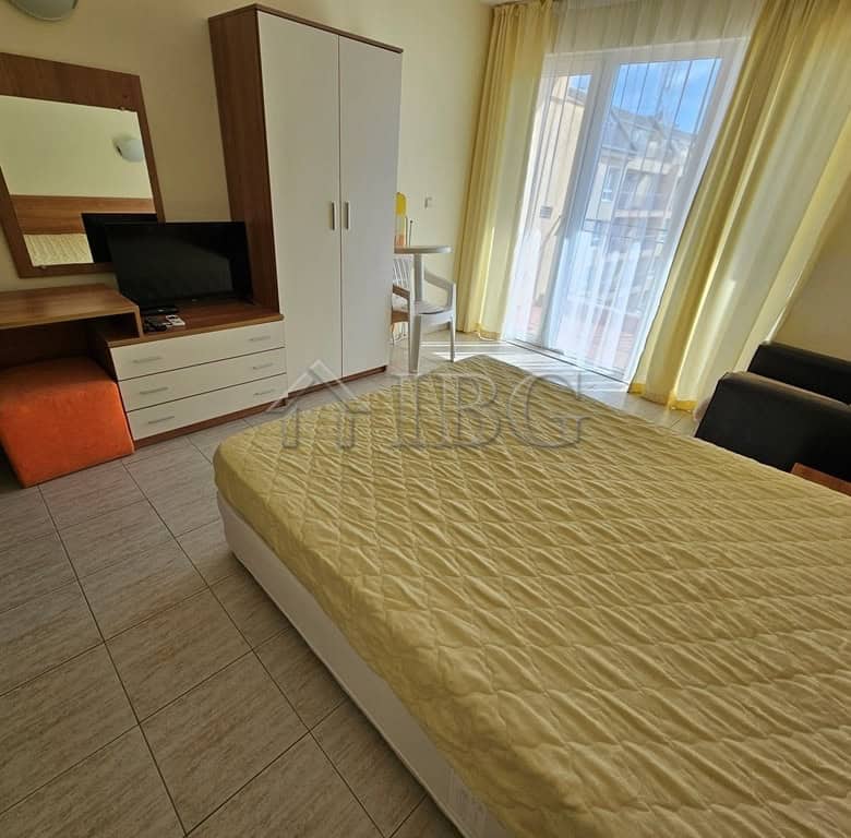 Studio apartment with balcony and pool view in Pollo Resort, Sunny Beach.