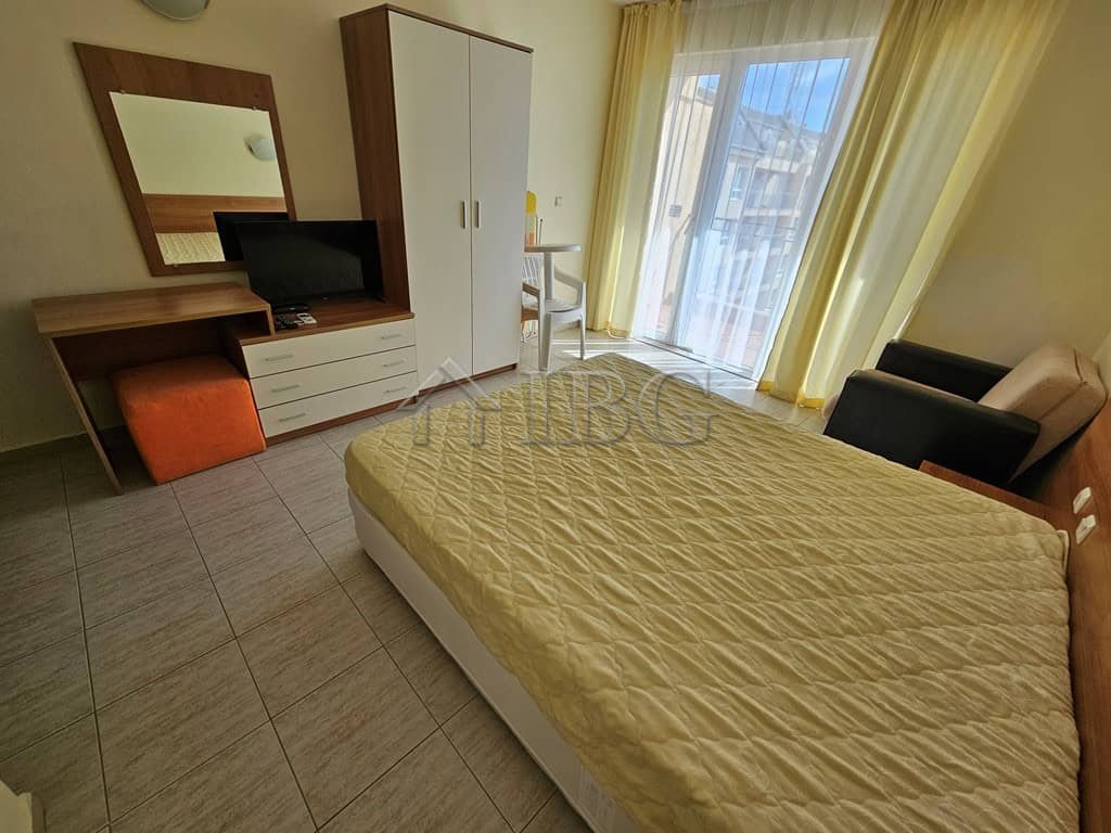 Studio apartment with balcony and pool view in Pollo Resort, Sunny Beach.