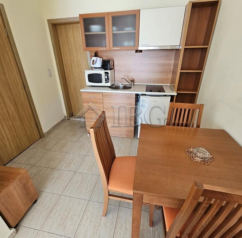 Compact studio with balcony overlooking pool at Pollo Resort, Sunny Beach.