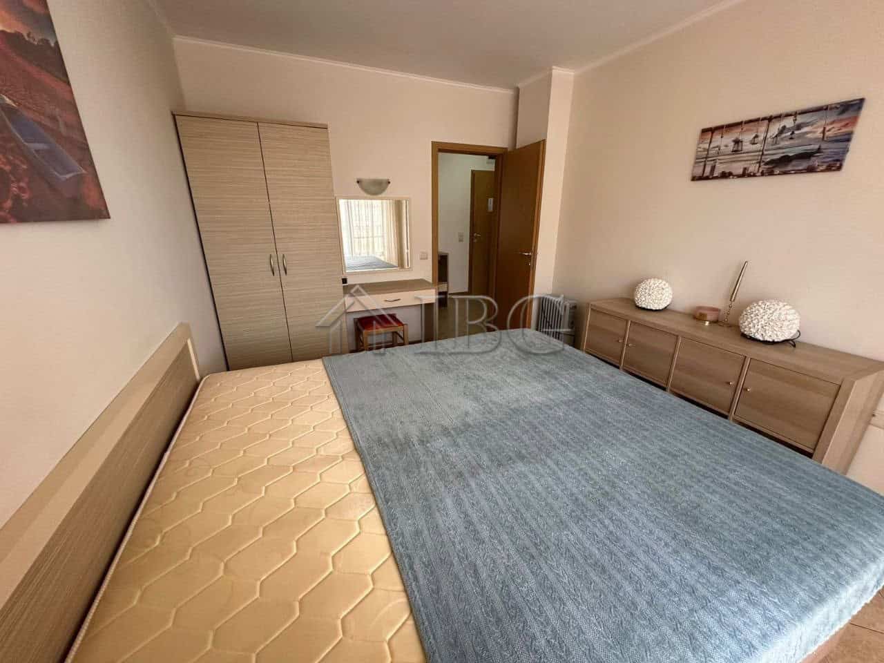Cozy bedroom with a large bed and modern decor in Royal Sun, Sunny Beach.