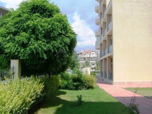 Bright garden view from a 1-bedroom apartment in Semiramida Gardens, Sunny Beach.