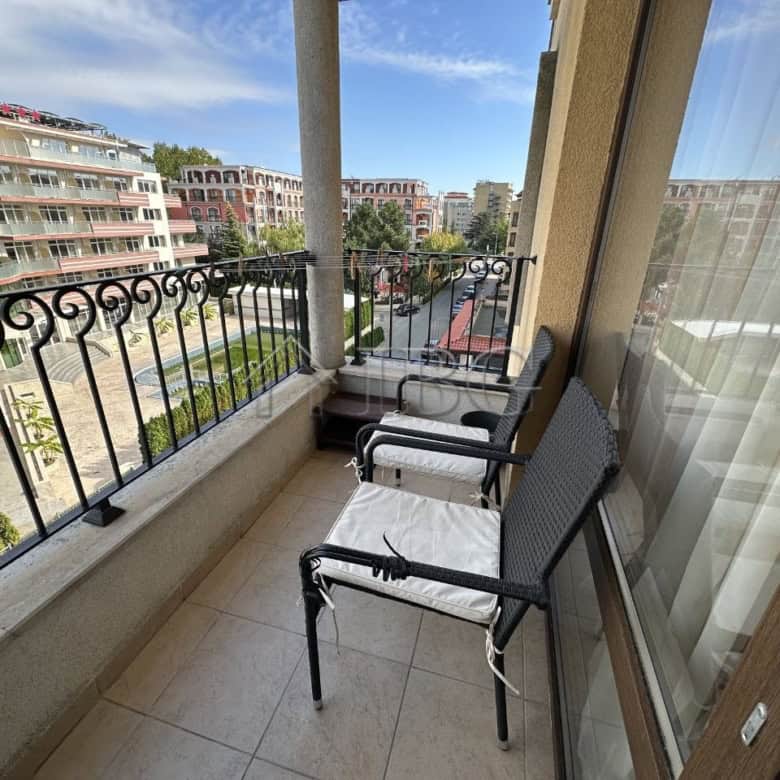 Balcony view of Royal Sun, Sunny Beach, with outdoor seating and cityscape.