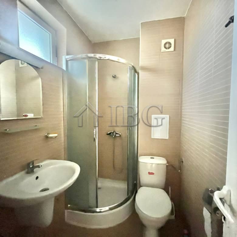 Modern bathroom with shower cabin, sink, and toilet in Sveti Nikola complex, Sveti Vlas.