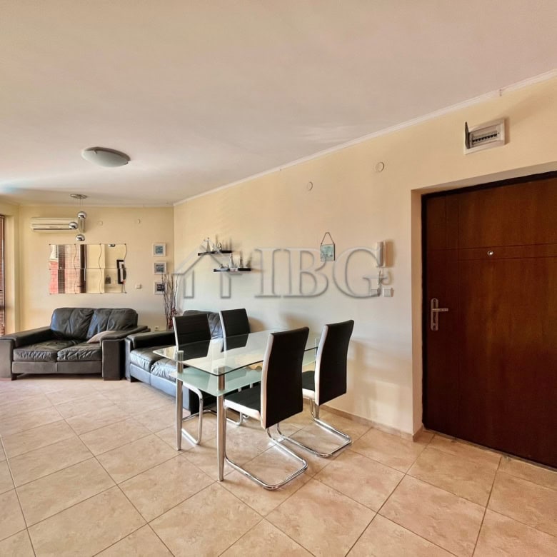 Bright living room with modern furniture and dining area in Apollon 4, Ravda.