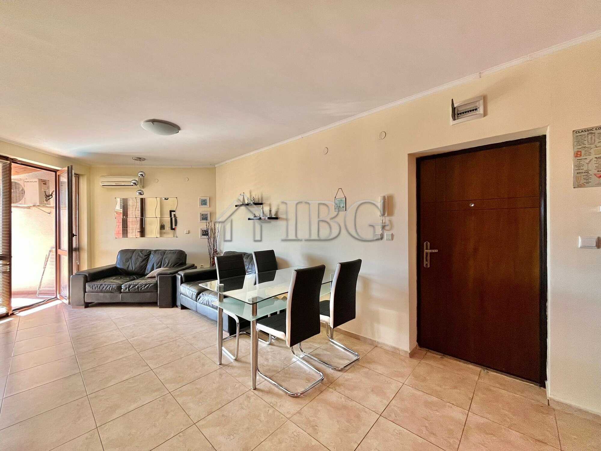 Bright living room with modern furniture and dining area in Apollon 4, Ravda.