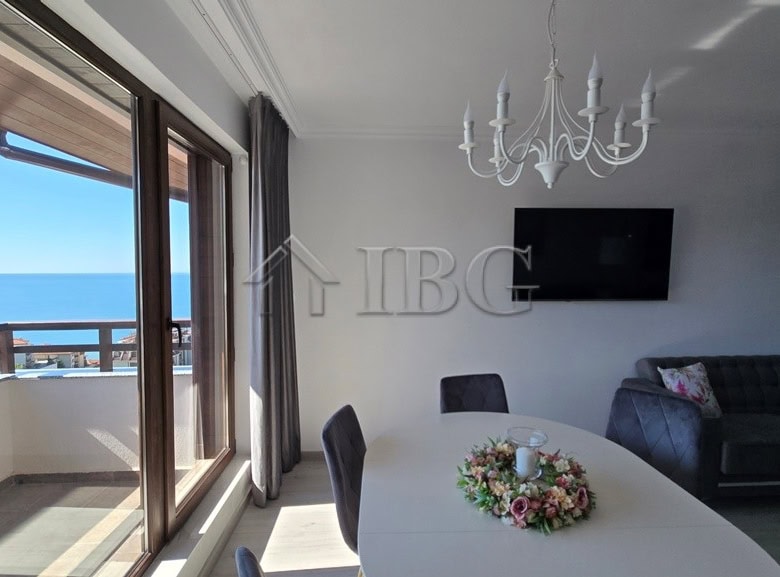 Bright living room with balcony view of the sea in Sveti Vlas apartment.