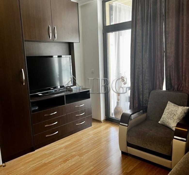 Bright living room with sea view in Dolce Vita 2, Sveti Vlas. Modern furniture, large windows, and b.