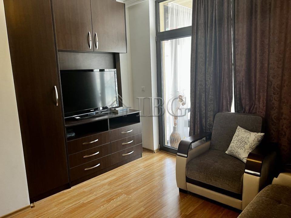Bright living room with sea view in Dolce Vita 2, Sveti Vlas. Modern furniture, large windows, and b.