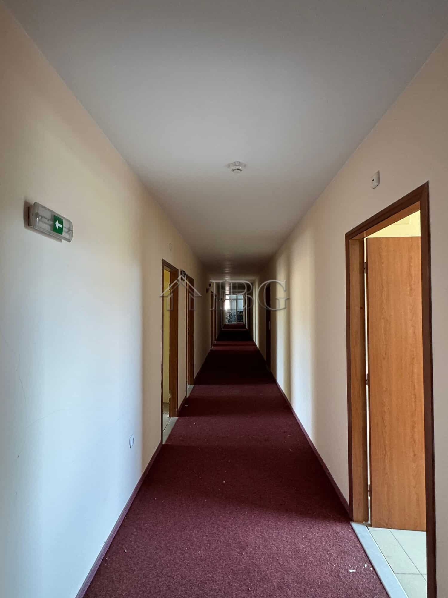 Hotel corridor with doors leading to rooms at Royal Central Hotel, Sunny Beach.