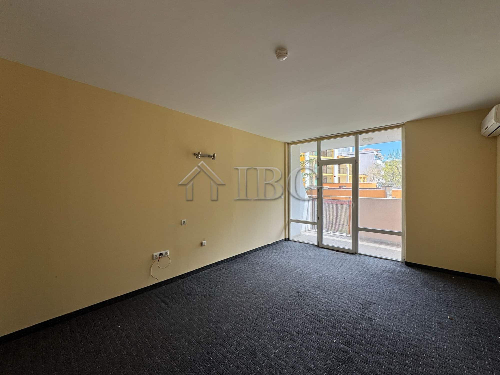 Hotel room with balcony and large windows in Sunny Beach, Bulgaria.