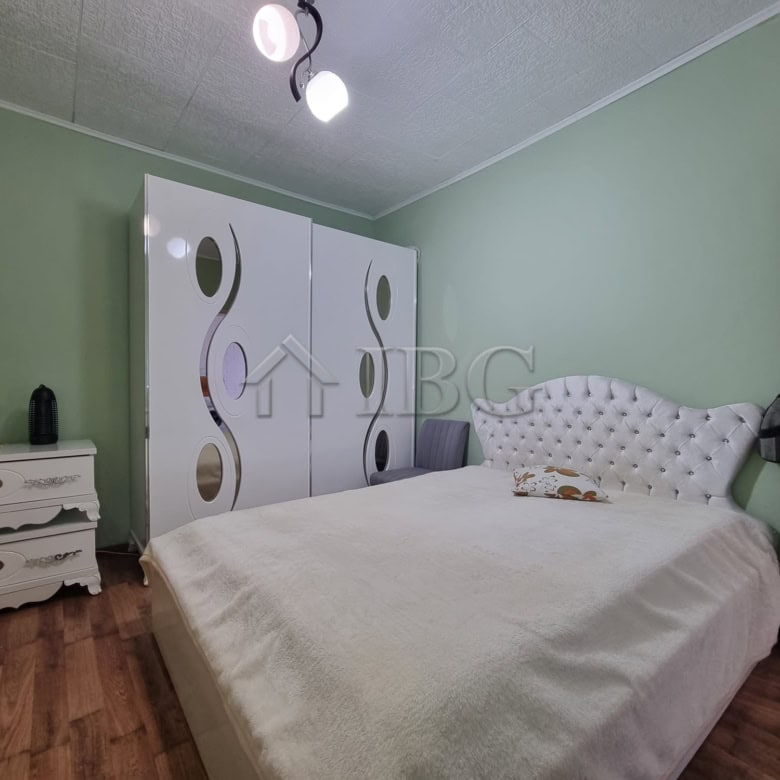 Cozy bedroom with wardrobe and bed in Vinarsko Village, Burgas Region. Ideal for peaceful living and.