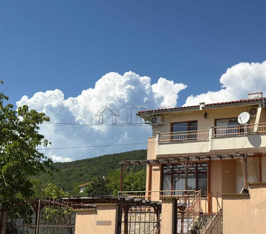 Two-storey house with balcony near the sea in Kosharitsa, Bulgaria.