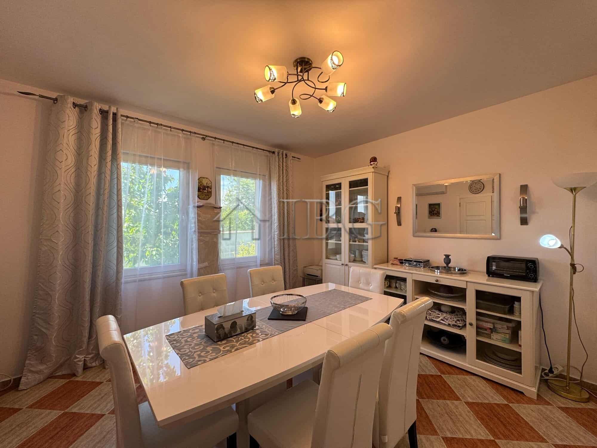 Bright interior of a spacious dining area in a two-storey house near Kosharitsa, 6 km from the sea.