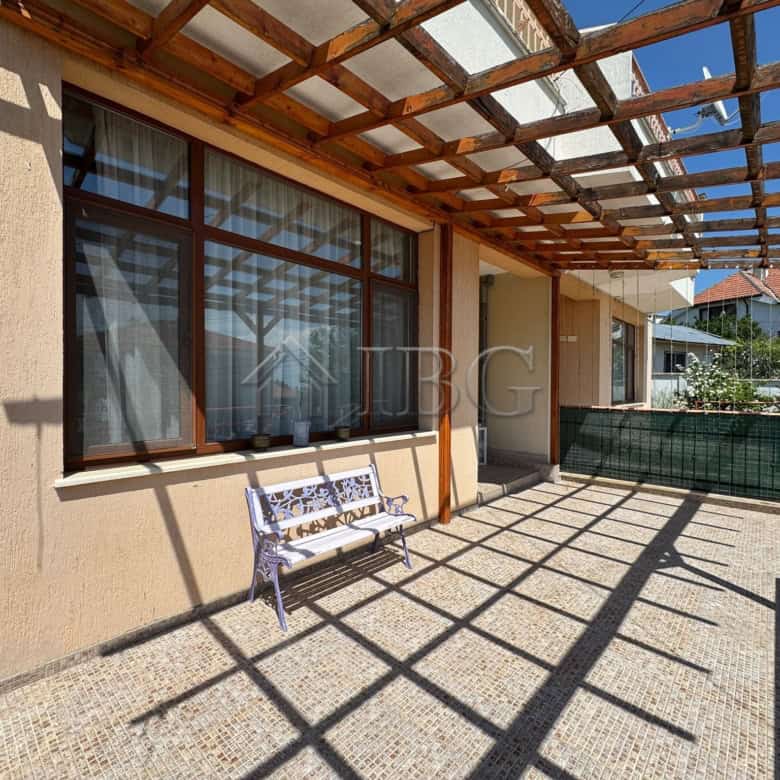 Outdoor terrace of a two-storey house in Kosharitsa, 6 km from the sea. Bright, open space with wood.