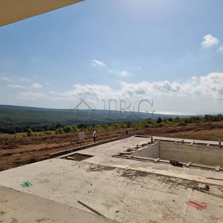 Pool and scenic sea view from Banya Village property.