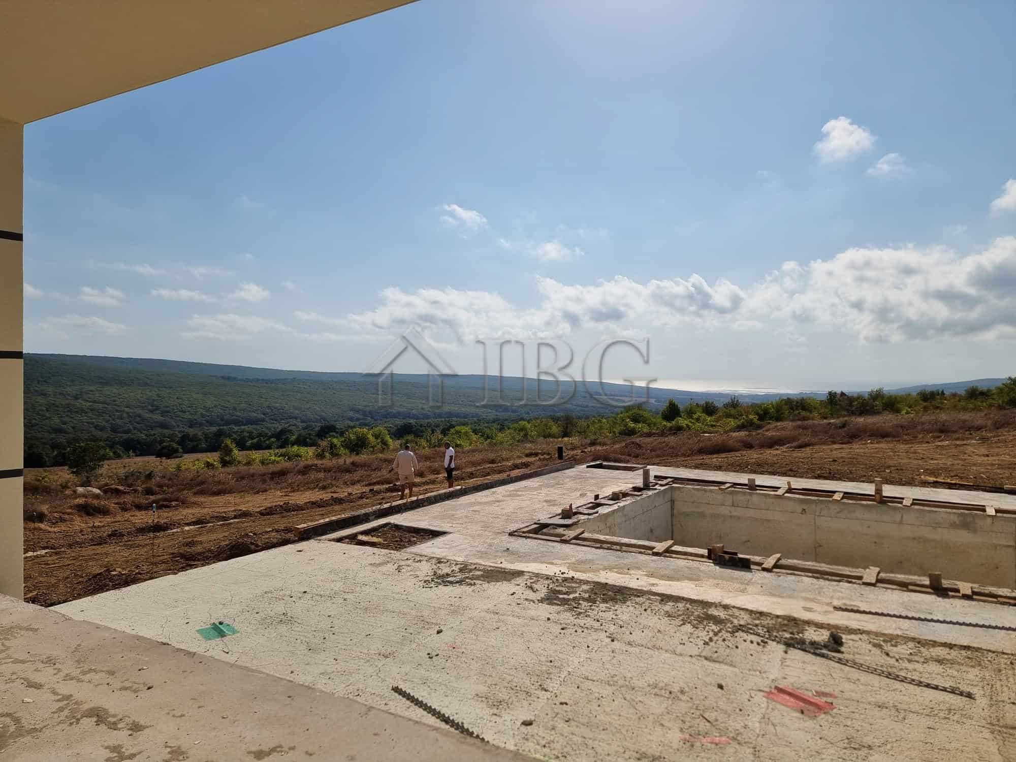 Pool and scenic sea view from Banya Village property.