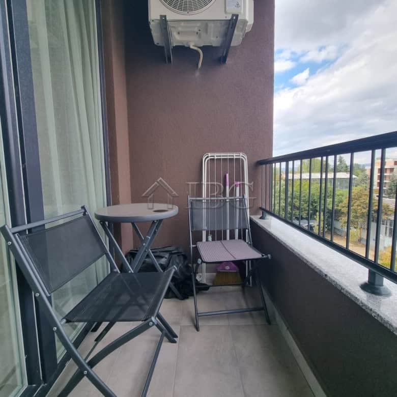 Balcony featuring outdoor seating and air conditioning unit at Domenico Complex, Sunny Beach.