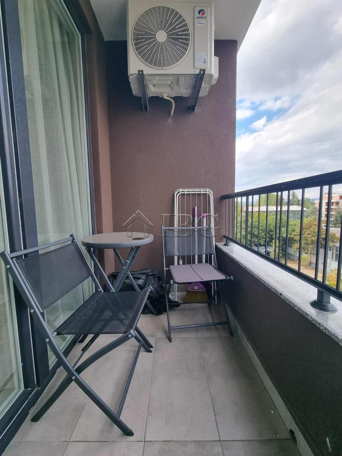 Balcony featuring outdoor seating and air conditioning unit at Domenico Complex, Sunny Beach.