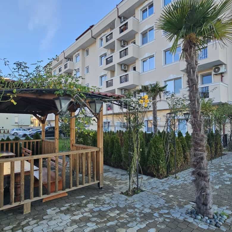 Bright apartment with outdoor terrace and lush greenery in Sunny Beach.