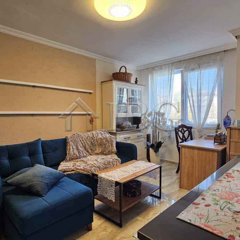 Bright living room with comfortable sofa and natural light in Magnolia 6, Sunny Beach.