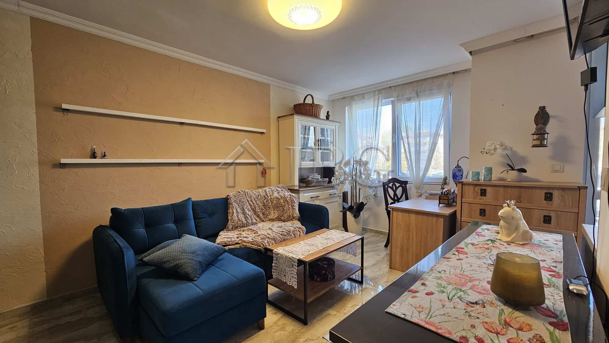 Bright living room with comfortable sofa and natural light in Magnolia 6, Sunny Beach.