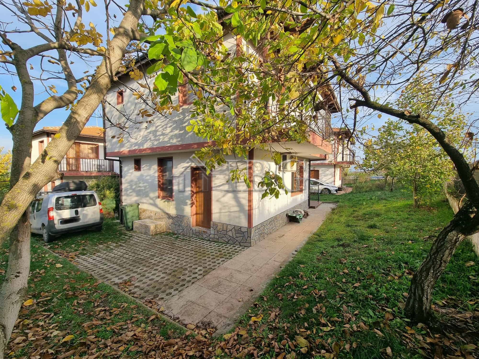 Two-story house in Aleksandrovo, Burgas Region, with garden and driveway.