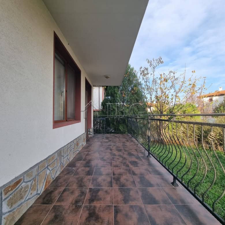 Balcony view of a two-story house in Aleksandrovo village, Burgas region, Bulgaria.