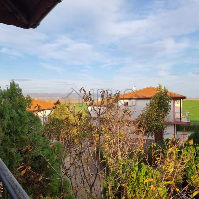 Two-story house for sale in Aleksandrovo, Burgas with garden and scenic views.