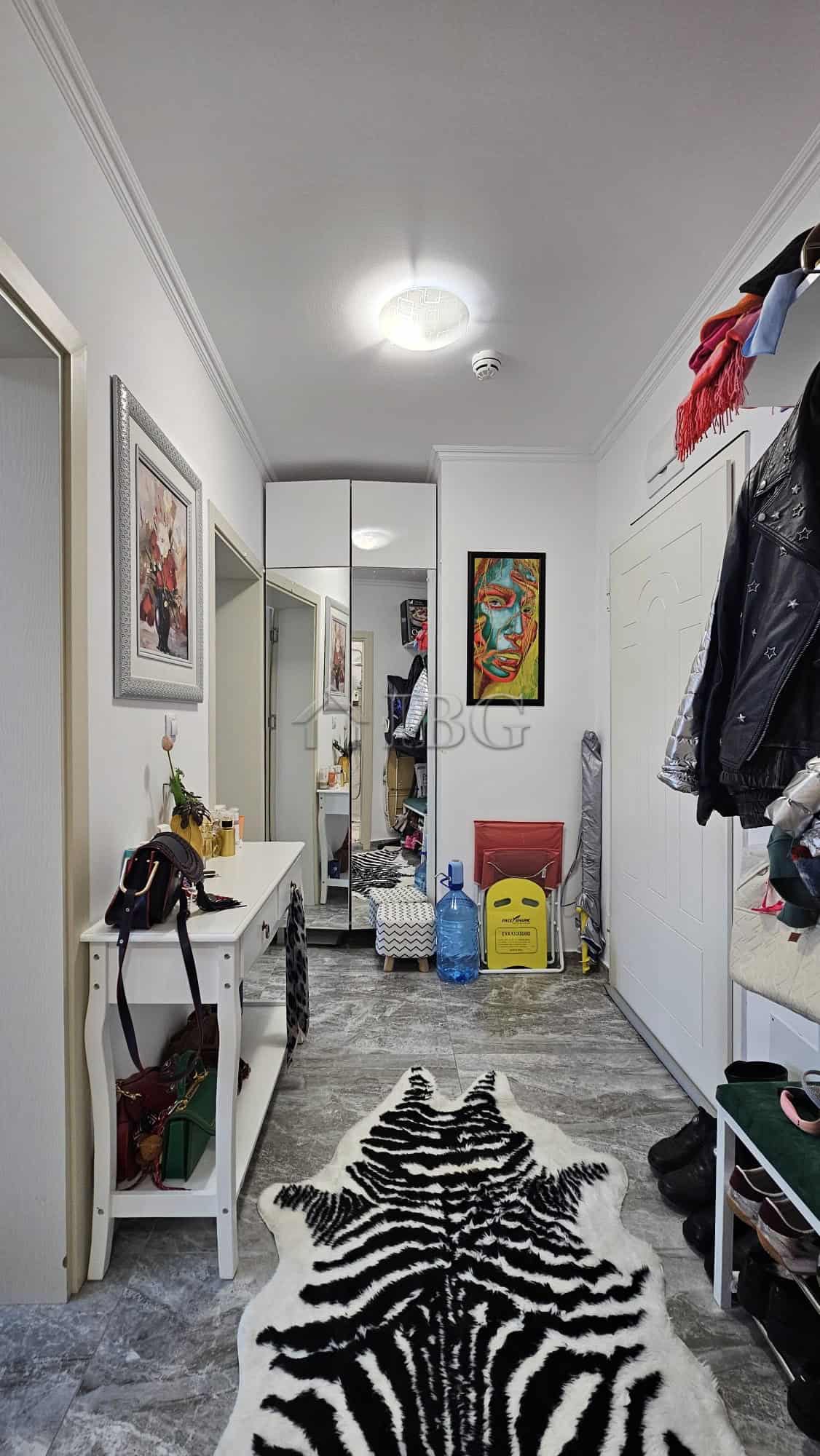 Bright entry hall with stylish decor and organized storage in Valencia Gardens, Nessebar.
