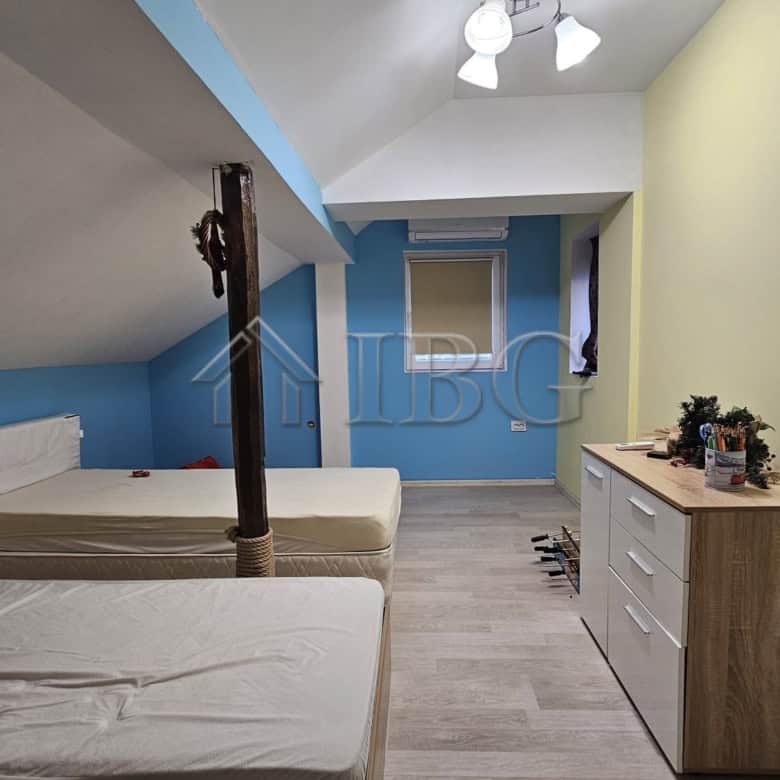 Bright interior of a 3-bedroom house with spacious yard, ideal for family living. Located near the s.