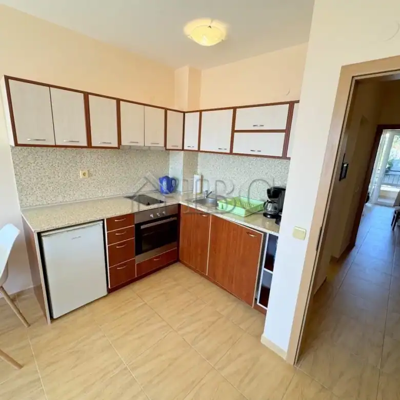 Spacious kitchen with ample storage and appliances in Sveti Vlas apartment.