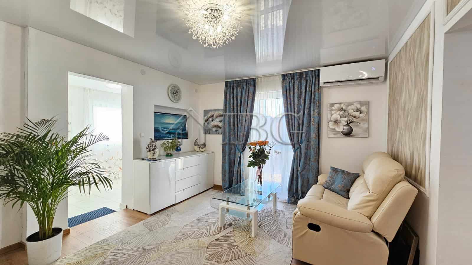 Bright, modern living room with stylish decor and comfortable seating. Perfect for relaxing near Sun.