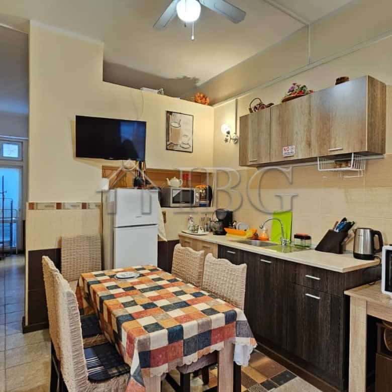 Bright kitchen with dining area in Sunny Beach property.