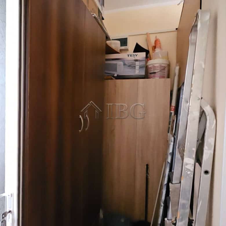 Interior view of storage room with shelves and supplies in Sunny Beach.