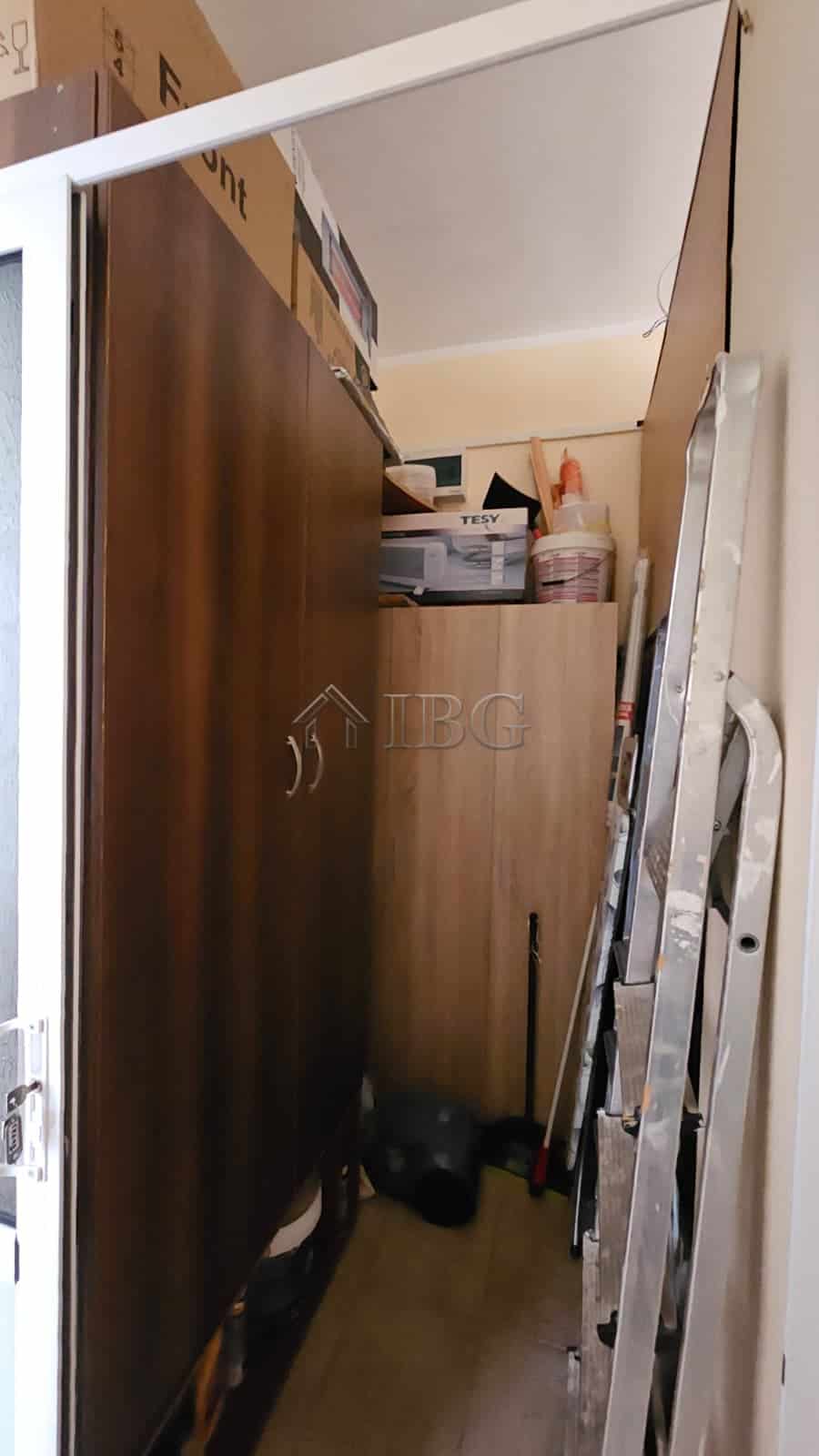 Interior view of storage room with shelves and supplies in Sunny Beach.