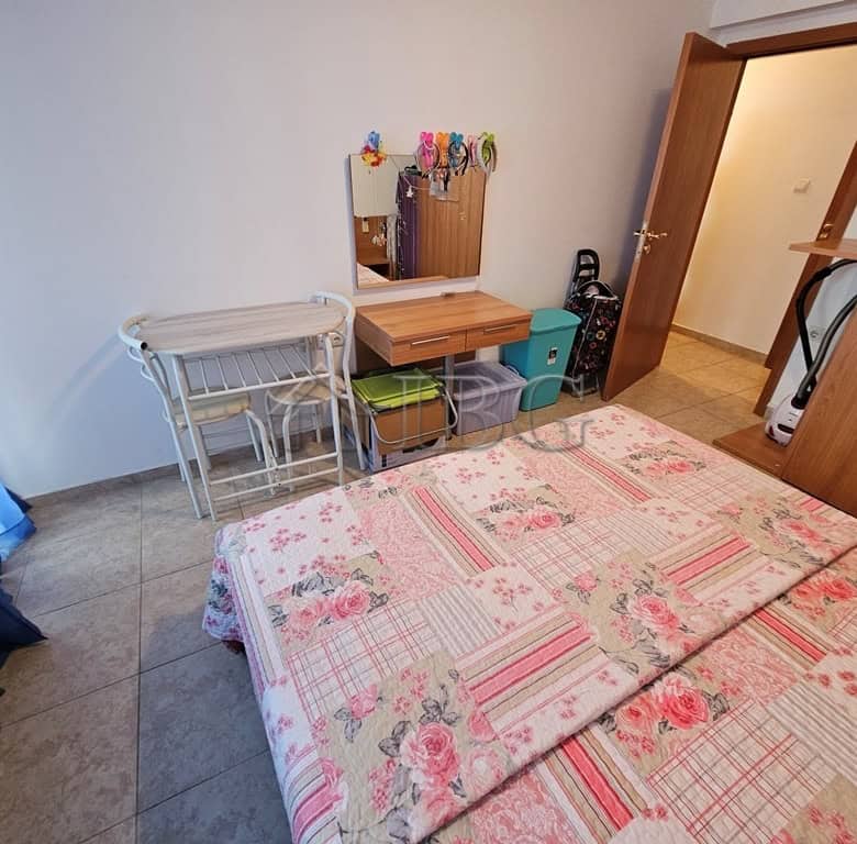 Bright interior of a 1-bedroom apartment with pool view in Sveti Vlas, Dinevi Resort.