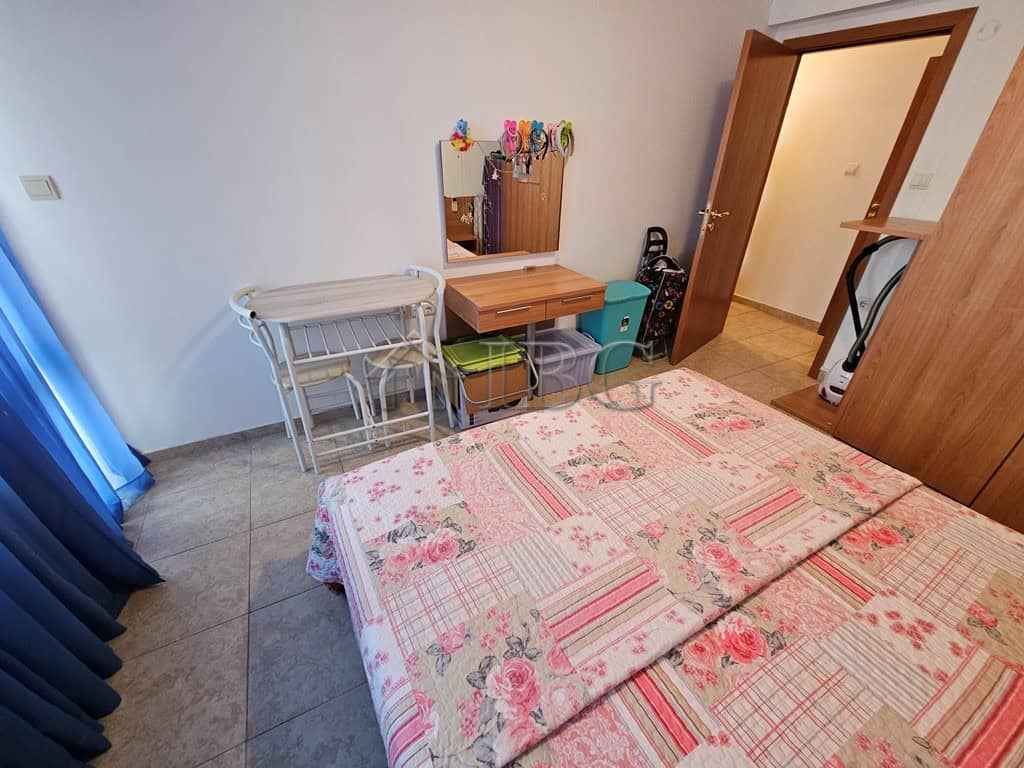 Bright interior of a 1-bedroom apartment with pool view in Sveti Vlas, Dinevi Resort.