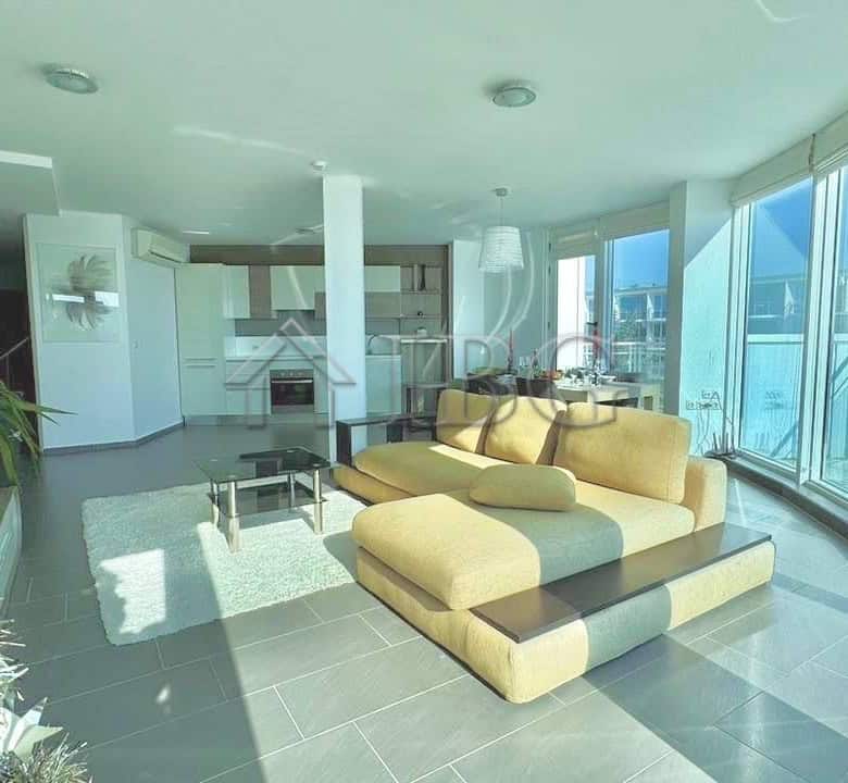 Bright living room with panoramic sea and pool views in Atlantis Resort, Sarafovo, Burgas.