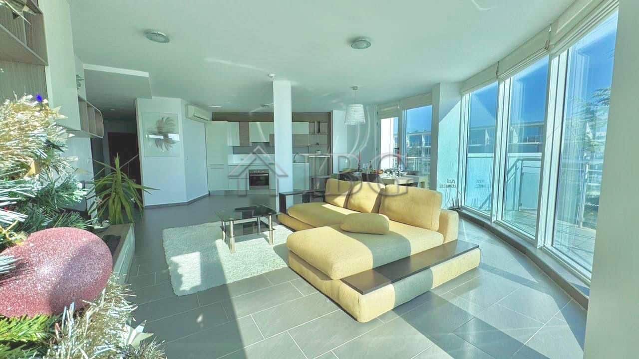 Bright living room with panoramic sea and pool views in Atlantis Resort, Sarafovo, Burgas.