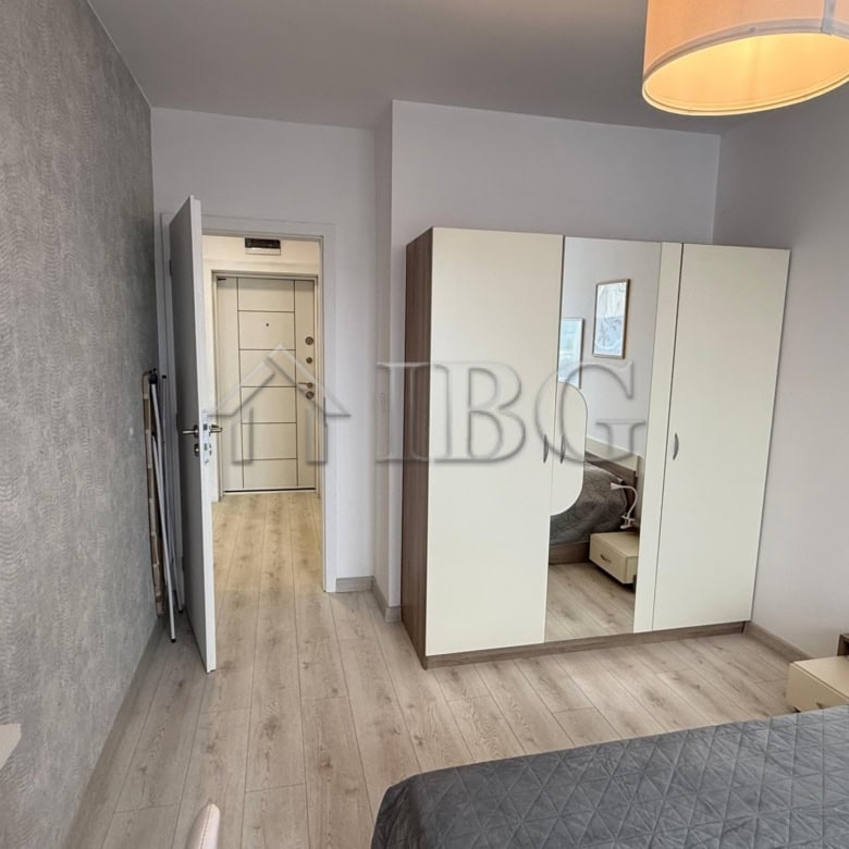 Elegant 1-bedroom apartment with modern furnishings at Pomorie Beach Resort, ideal for relaxing seas.